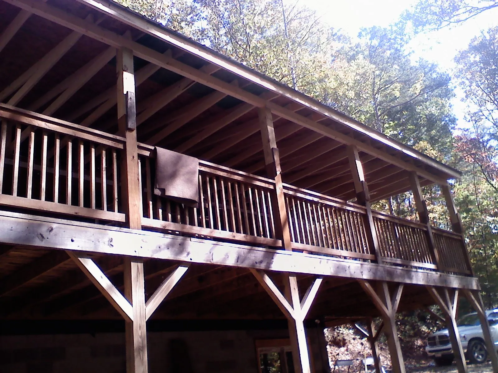 Timber framing under a new elevated porch and deck — Roof Leak Repair in Seekonk by Roofing Brothers